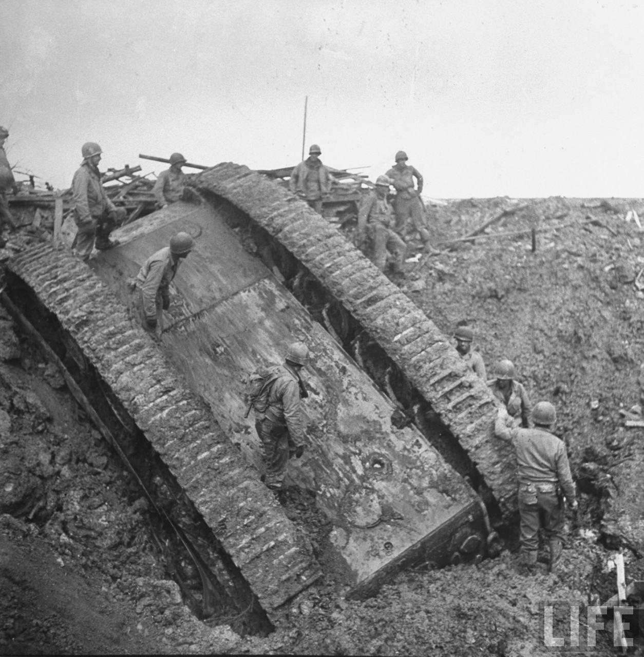 Panzer overturned by air attack. Dec 1944. (Life)