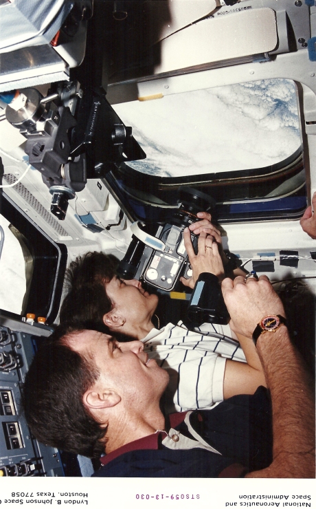Kevin Chilton and Linda Godwin shoot science targets on the Red Shift aboard Endeavour. (NASA sts059-13-030)