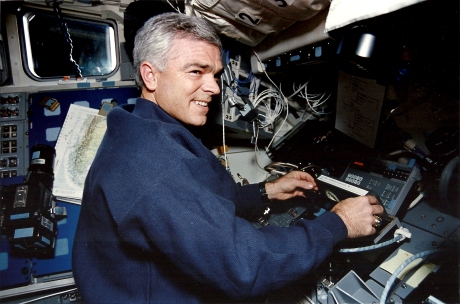 Rich Clifford inserts a data storage cassette into one of our 3 high rate recorders. Each tape cassette held 50 Gb of data. We carried more than 100 onboard, with a tape change about every 30 mins for 11 days. (NASA STS059-09-12)