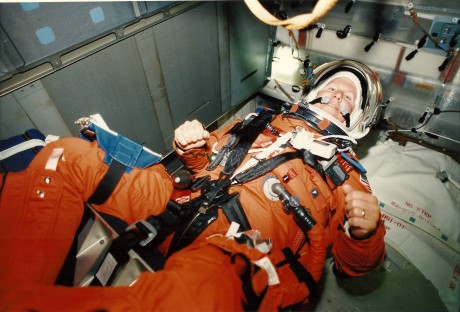 Tom Jones strapped into Endeavour's middeck MS-4 seat, during countdown rehearsal in early August, 1994. (NASA ksc-94pc-967)