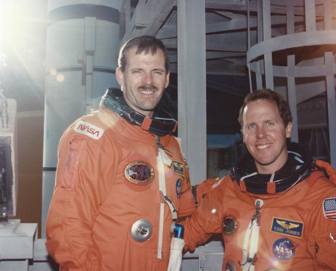 Smith and Jones wait their turns to strap in aboard Endeavour, Aug. 1, 1994. (NASA)